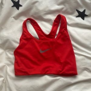 Red racer back Nike sports bra